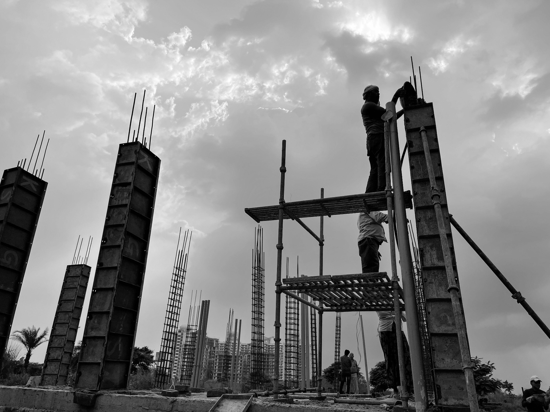 Construction workers building a large-scale infrastructure project